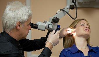 Wax removal and ear exam with the aid of an ENT microscope  is critical prior to a comprehensive  hearing evaluation.