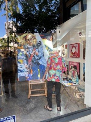 Ruby Mazur himself embellishing Tom Petty's print.