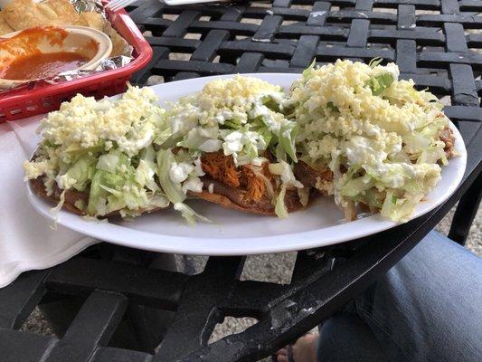 Order of three tostadas- two chicken; one bean