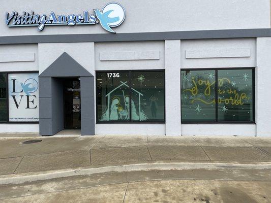 Office front decorated for Christmas.