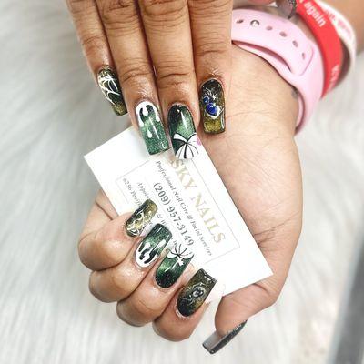 Cat-eye claws and Halloween hues at Sky Nails! #HalloweenNails #CatEyeMani #SkyNailsMagic #SpookyNailArt #skynails209 #nailsdesign #nails