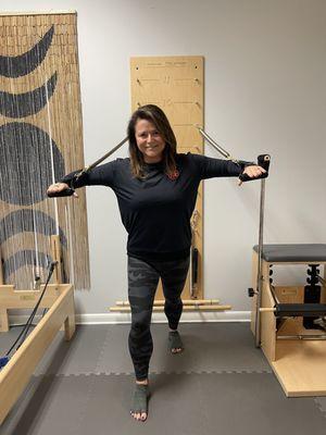 Pilates instruction utilizing reformer, springboard and combo chair