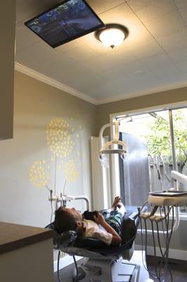 Kids can watch movies or play video games during their appointment!
