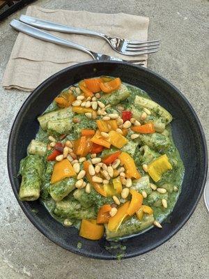 Rigatoni with a tart zesty mustard green pesto with bright tangy pickled bell peppers.