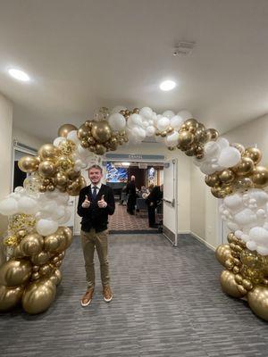 Organic golden balloon arch