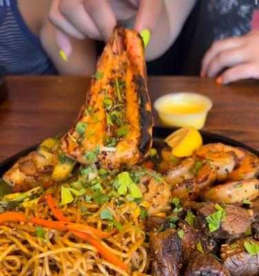 Lobster tail, shrimp, steak, and yakisoba noodles