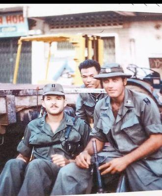 Cpt David Firestone w buddy in Saigon Viet Nam wr