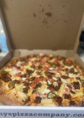 Mexicana with pineapple - our version of a pastor pizza. Order with Canadian bacon and it's so delicious!