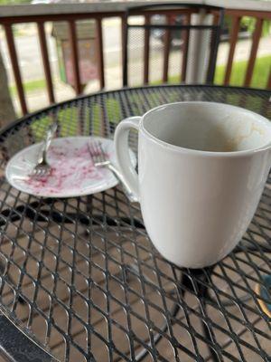 The remnants of a raspberry/blueberry pie and a Blueberry Latte.