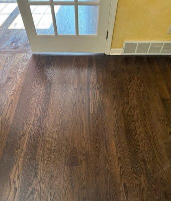 Refinished floors (dusty from work around house). Amazing in person