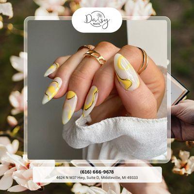 Elegant white nails with golden marble patterns -- classic, radiant, and effortlessly luxe. Book your timeless mani today!