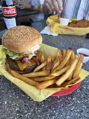 1/2 LB. Heart Attack Burger with fries.