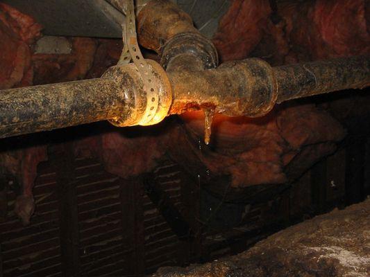 Corroded waste pipe
