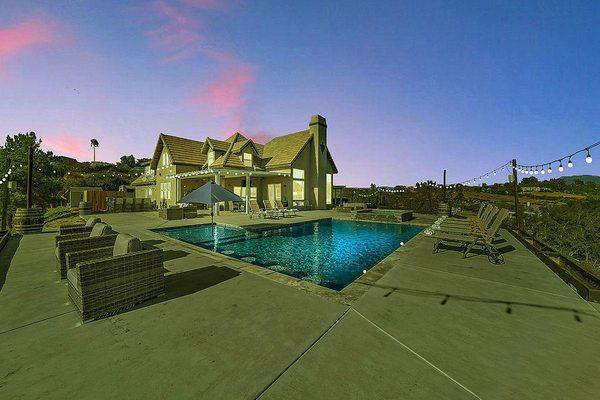 View of 7 BR AirbnB Temecula Wine Country STR rental with string lights remote control device Denny helped me find. Wanna rent?