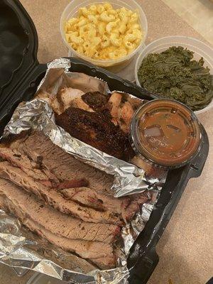 Two meat combo with brisket, chicken, macaroni and cheese, and kale greens.