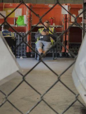 Lazy worker very busy watching reels