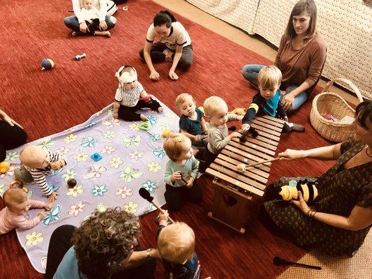 Our 15-month-old twins up front and center with Ms. Kathy.