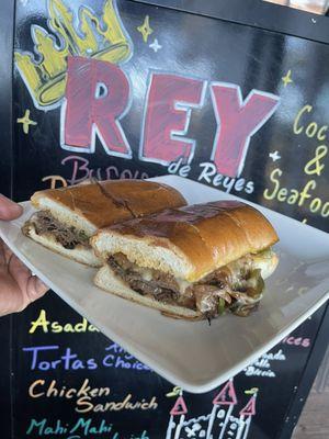 Philly steak sandwich with fries