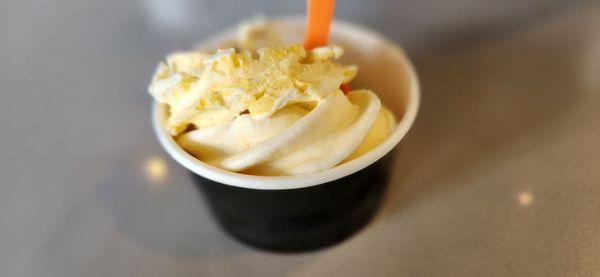 Vanilla soft serve and mango topping