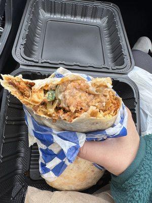 Chilaquiles burrito with chorizo added ... amazing!!!! So much food