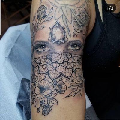 Upper arm tattoo by Zack Carpenter of Snake Byrd Ink.