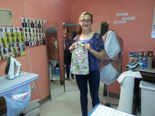 G. just finished a sewing bag. It has two outside pockets and one small one on the inside