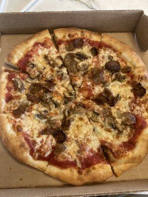 Small Cheese (10") with sausage and mushrooms. Mediocre at best.