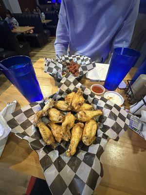 Naked traditional wings, spicy barbecue boneless wings