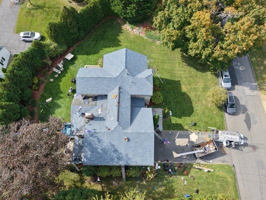 Professional roof installation underway -- quality workmanship from start to finish.