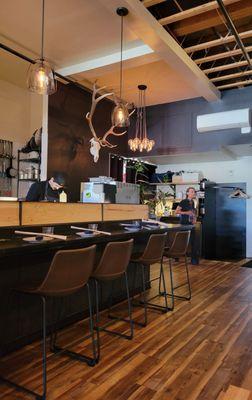 Open kitchen and chef's counter seating