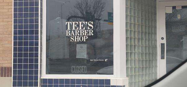 Doorway to Tee's Barbershop, 120 Greenwood Avenue, Tulsa, Oklahoma.