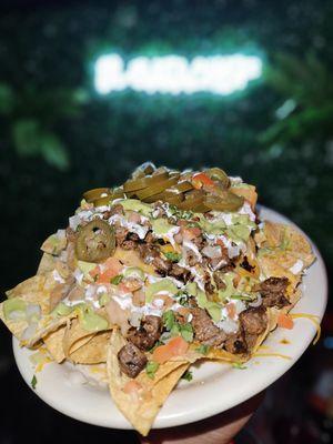 supreme nachos served mountain high