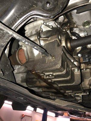 Leak created by dealer. They never let you see them work on your car claiming insurance or terrorism. But really for their own motives.