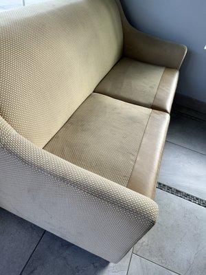 Check in waiting couch. Super dirty and nasty.