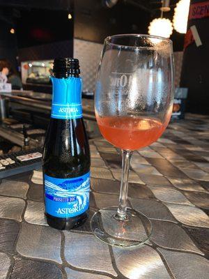 Astoria Prosecco w/ Pomegranate Liquor and a splash of pineapple juice;-)