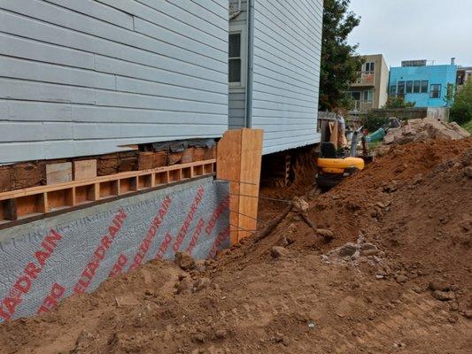 Exterior 10ft high retaining garage wall
