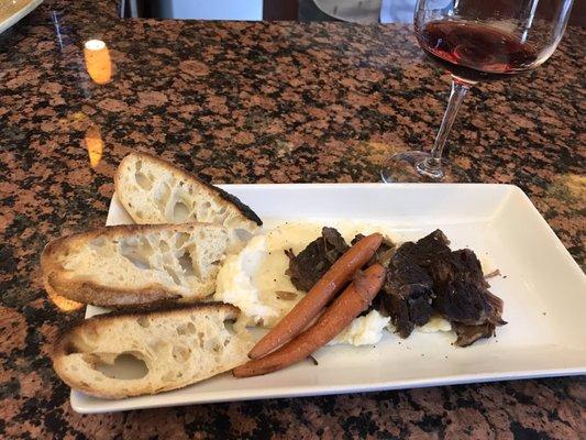 Amazing braised short ribs with truffle mashed potatoes paired with an awesome Super Tuscan. Yum!!!