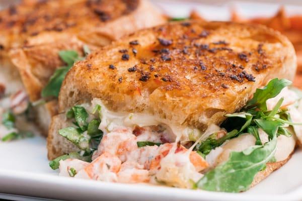 Lobster Grilled Cheese-cold water lobster w/ mascarpone & provolone cheeses. diced tomatoes, scallions, arugula and chili. on Red Bicycle