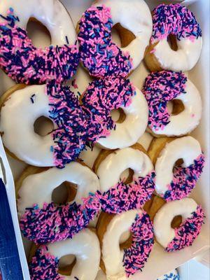 Vanilla glazed donuts with sprinkles