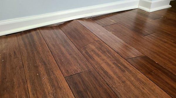 This flooring pused up the quarter round about 3 inches