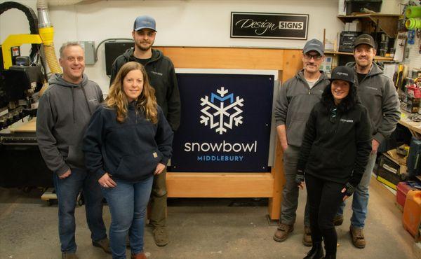 Our 2024 Middlebury Snowbowl team pic located in our shop.