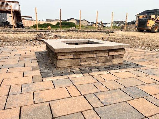 Patio with fire pit. Techo-Bloc Mista paver with Antika accent. Prescott fire pit.