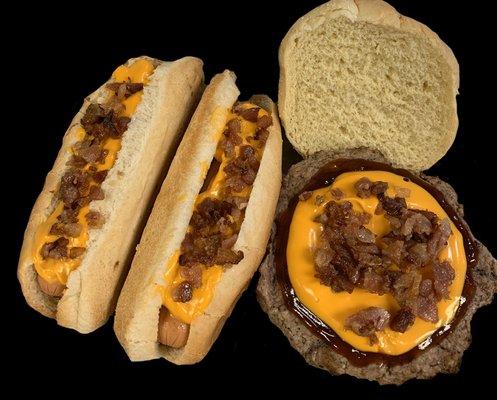 Bulldog burger and hotdogs. Aged cheddar cheese sauce, BBQ sauce and bacon