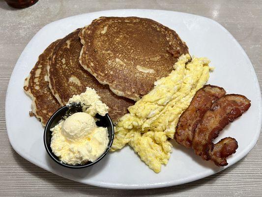 The off menu, Early Bird Magnificent seven. 3 pancakes, 2 scrambled eggs, & 2 crispy bacon strips for $4.99. Heck ya!!