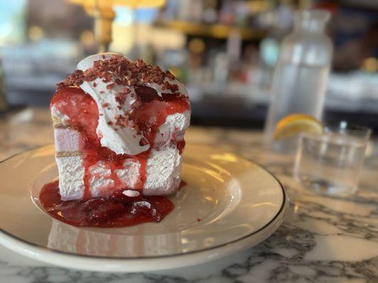 Strawberry ice cream, chilled whipped cream, strawberry compote and a pie crust