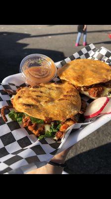 Mulita de Alpastor consist of a crispy tortilla filled with chunks of grilled meat, cheese, cilantro&cebolla,raddish, and spicy Red salsa.