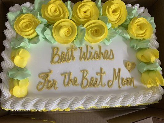 White cake with fruit in the middle.