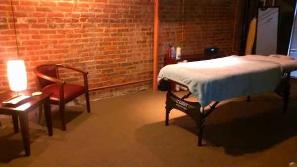 My treatment room.  Very big and open, with good lighting.  Will be having a couple's massage session next time.