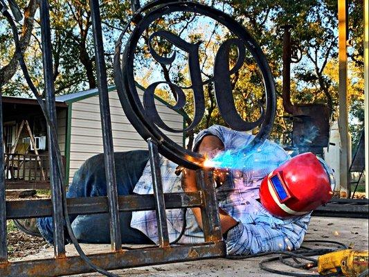 Our top welder Ferrell working on a custom entrance gate.