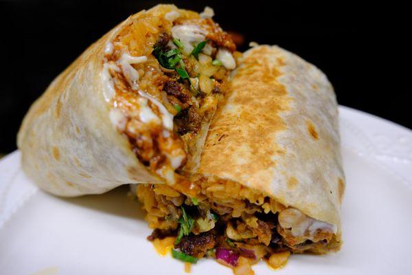 Come try our Super Burrito mixed with Carne Asad & Al Pastor!